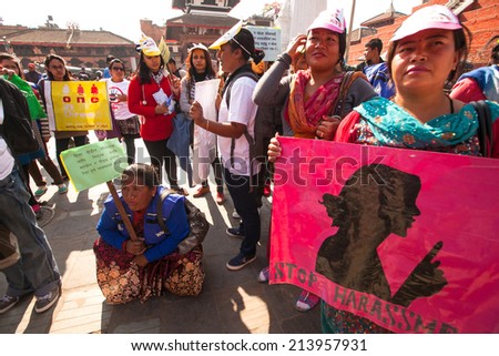KATHMANDU, NEPAL - NOV 29, 2013: Unidentified participants protest within a campaign to end violence against women (VAW) Held annually since 1991, 16 days from Nov 25 to Dec 10.