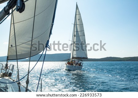 ERMIONI - POROS, GREECE - OCT 9, 2014: Unidentified sailboats participate  in sailing regatta \