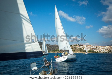 ERMIONI - POROS, GREECE - OCT 9, 2014: Unidentified sailboats participate  in sailing regatta \
