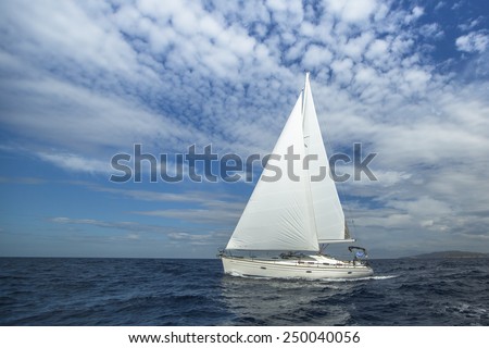Cruising on a sailing boat. Boat in sailing regatta. Luxury yachts.