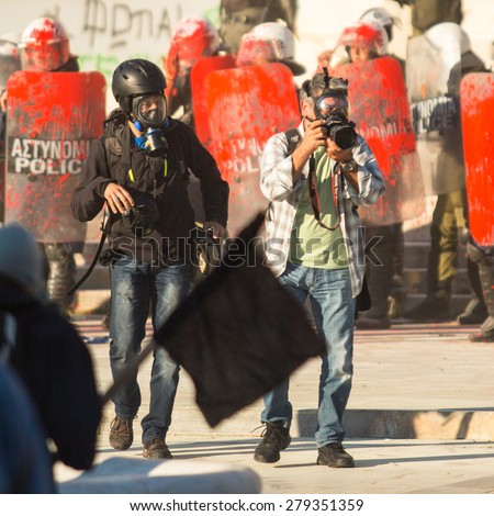 ATHENS, GREECE - CIRCA APR, 2015: Unknown photographers. Anarchist groups seeking abolition of new maximum security prisons, clashed with riot police, who responded with tear gas and stun grenades.
