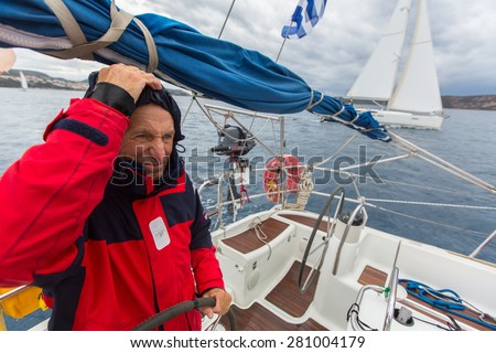PYLOS, GREECE - CIRCA OCT, 2014: Sailors participate in sailing regatta 12th Ellada Autumn 2014 among Greek island group in the Aegean Sea, in Cyclades and Argo-Saronic Gulf.