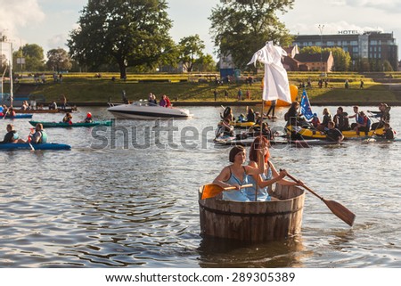 KRAKOW, POLAND - JUNE 21, 2015: Unidentified participants during a public event called 4th Water Critical Mass. The annual event is held for since 2012 under the motto - Vistula for All.