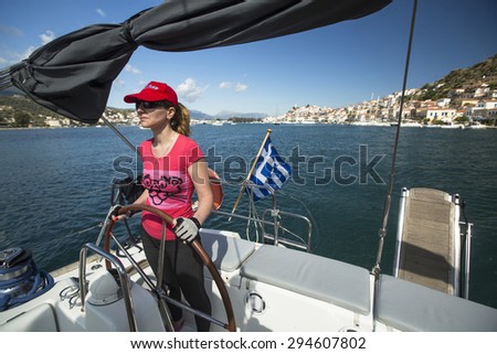 POROS - ERMIONI, GREECE - CIRCA MAY, 2014: Sailors participate in sailing regatta 11th Ellada 2014 among Greek island group in the Aegean Sea, in Cyclades and Argo-Saronic Gulf.