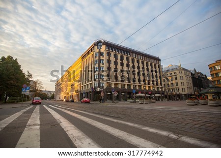 RIGA, LATVIA - SEN 13, 2015: One of the streets of old Riga. Riga has long been a Hanseatic city, there are buildings of different styles from medieval to modern architecture.