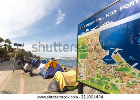 KOS, GREECE - SEP 27, 2015: Tents war refugees in the port of Kos. According to the coast guard, every day on a Greek islands can be reached from 600 to 800 refugees.