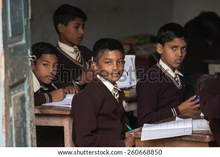 SARANATH,INDIA-DECEMBER 03, 2012.:The unidentified Indian students at the class room in Thai Saranath school on December 03,2012 in Pelling,India.