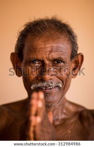 GAYA,INDIA. 6 AUGUST 2015;  Old Indian Man portrait shot outside.