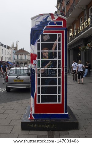 WINDSOR, UK - JULY 21: Prince Harry of Wales depicted on Timmy Mallet\'s Ring a Royal Post Box. Art installation celebrating all things British, on July 21, 2013 in Windsor, UK.