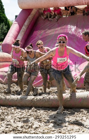 SOUTHAMPTON, UK - JULY 4 : Women gather for the annual Race for Life Pretty Muddy fun run, to raise money for Cancer Research. 4 July 2015 in Southampton, UK.