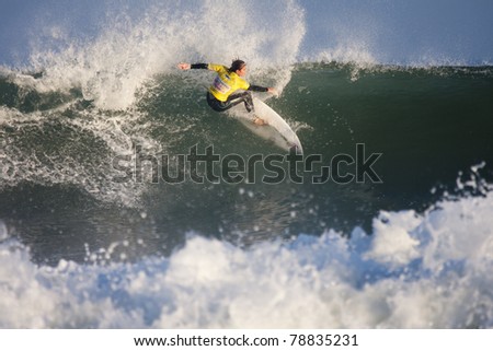 SEIGNOSSE, FRANCE - JUNE 3: Woman surfer Cannelle Bulard at the Swatch Pro France on June 3, 2011 in Seignosse, France.