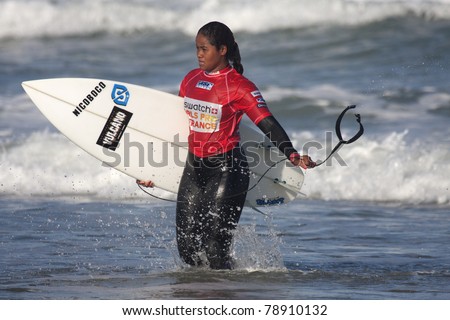 SEIGNOSSE, FRANCE - JUNE 3: Surfer Swelen Naraisa at the end of her contest at the Swatch Pro France on June 3, 2011 in Seignosse, France.