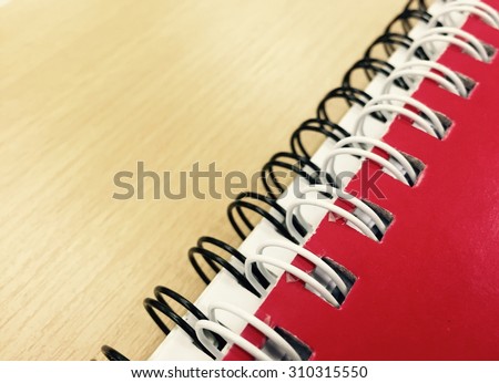 ring binder notebook on wood table