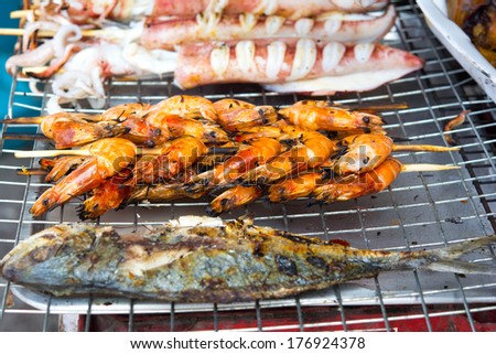 Seafood barbecue of grilled Shrimps on charcoal oven