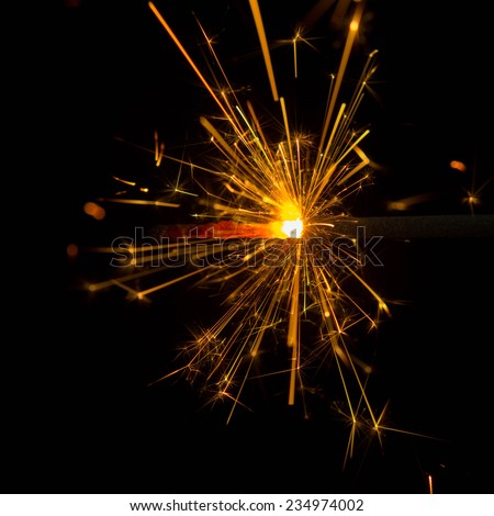 sparks on a black background electric short circuit