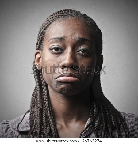 portrait of young black woman sad