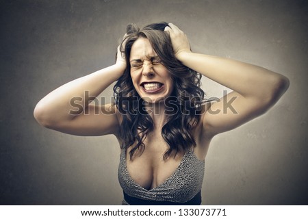 desperate woman with hand in the hair