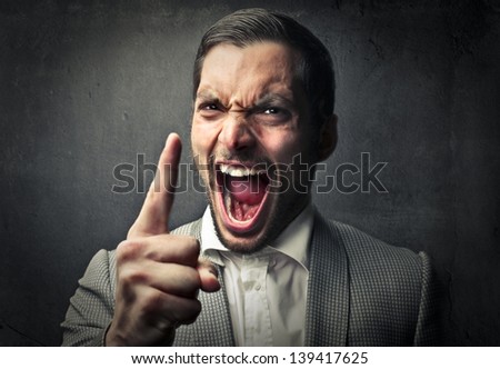 portrait of furious man screaming