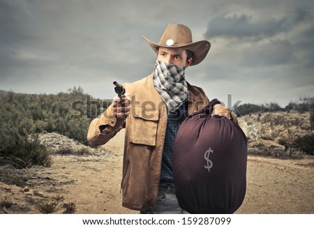 bandit with gun and big sack of money