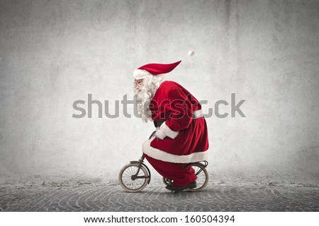 Similar – Image, Stock Photo Santa Claus riding bicycle along mountain road