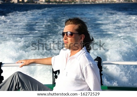 a portrait of a man on the boat