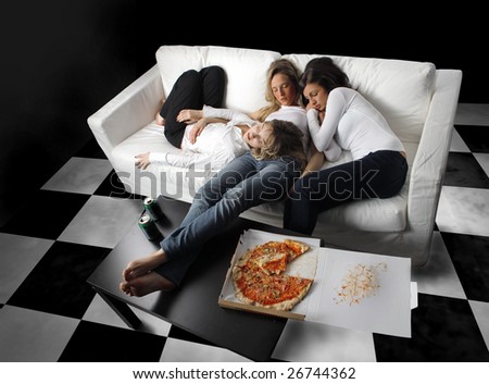 group of girls sleeping on a sofa after a party