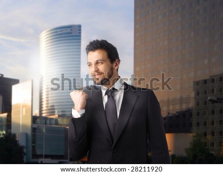 Successful business man against a urban background