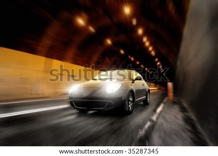 car running in a tunnel