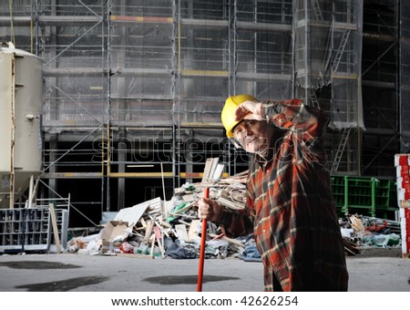senior worker in construction yard