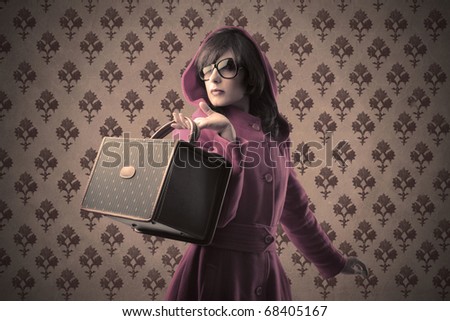 Beautiful woman holding a fashion bag