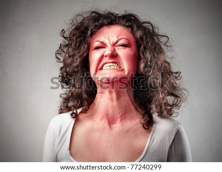 Woman With Aggressive Expression Stock Photo 77240299 : Shutterstock