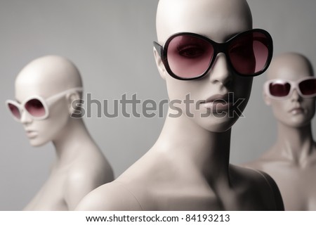 Mannequins wearing fashion sunglasses