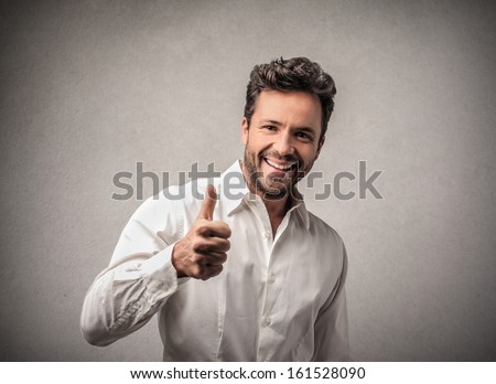handsome man with thumb up