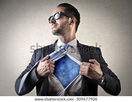 Businessman showing his super powers