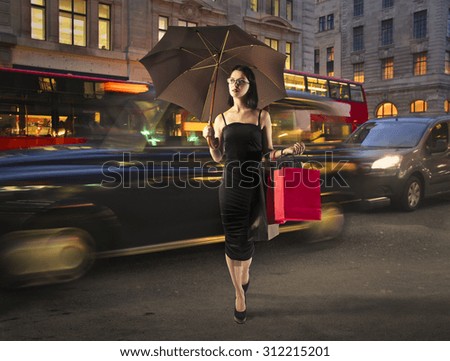Sophisticated woman walking in the street