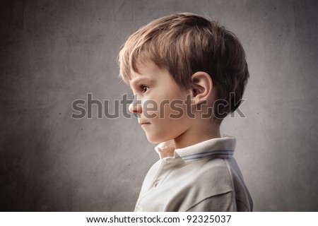 Similar – Image, Stock Photo profile of a boy  walking in the garden and looking forward