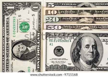 American money fanned out. 100, 50, 20, 10, and 5 dollar notes.  A one dollar bill is on the left. Isolated on white.