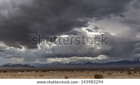Impressive rain clouds over dry prairie
