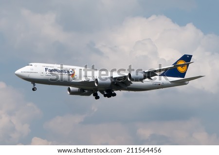 Frankfurt, Germany, August 06, 2014: A Lufthansa Boeing 747-8 landing in FRA. For a limited time the Fanhansa logo replaces the original LH logo on 8 aircraft to mark the Football World Cup in Brazil.