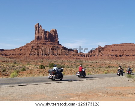 MONUMENT VALLEY, USA - SEPTEMBER 22: Road of Monument Valey on  Sepetmeber 22, 2011. The largest sandstone buttes reaching 1,000 ft (300 m) above the valley floor.