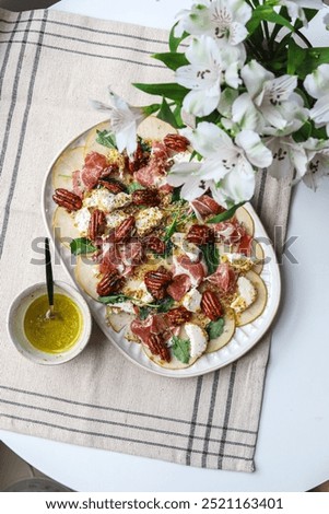 Similar – Image, Stock Photo Served pears with pecan and soy sauce