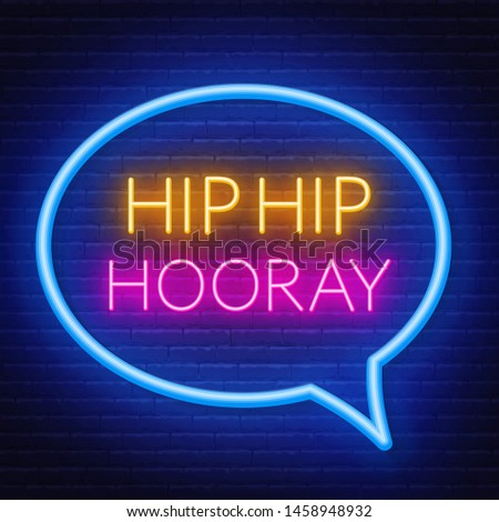 Neon sign hip hip hooray in frame on dark background. Light banner on the wall background.