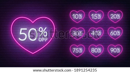 Valentine day discount neon design. 10, 15, 20, 30,40,50, 60, 75, 80, 90 percent off . Neon signs in a heart shape frame.