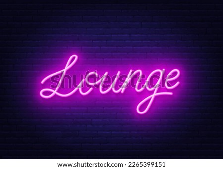 Lounge neon sign on brick wall background.