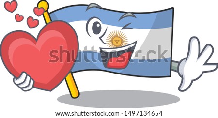 With heart argentina character flag folded above table