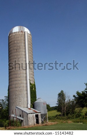 An old farm silo against a clear Kansas sky.
