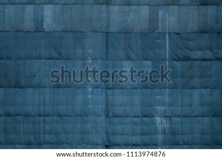 Image, Stock Photo Scaffolding with protective net and tarpaulin from frog perspective / house renovation