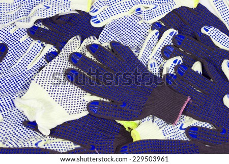 Work gloves black white cotton isolated background