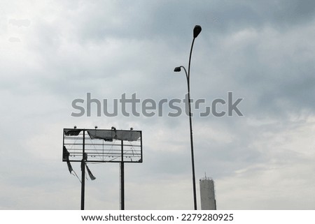 Similar – Image, Stock Photo Broken billboard on an ugly wall