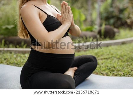 Similar – Image, Stock Photo Pregnant woman doing yoga at home